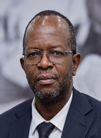 Mr. Dominique BUISHA